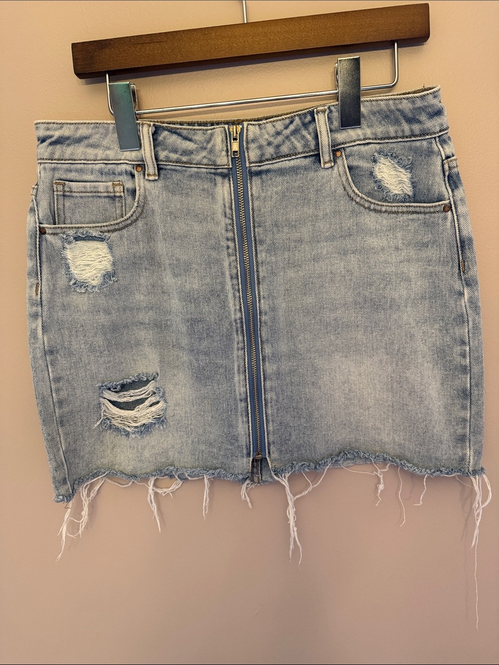 Light Wash Distressed Denim Skirt with Front Zip